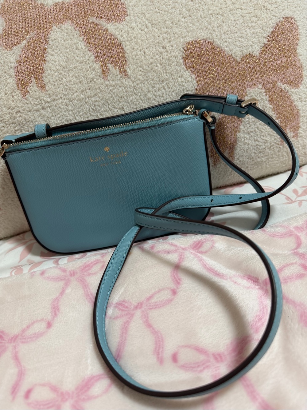 kate spade light teal leather crossbody bag with gold-tone logo